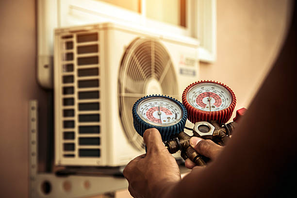 Professional Heat Pump Repair technician working in Fayette, MS